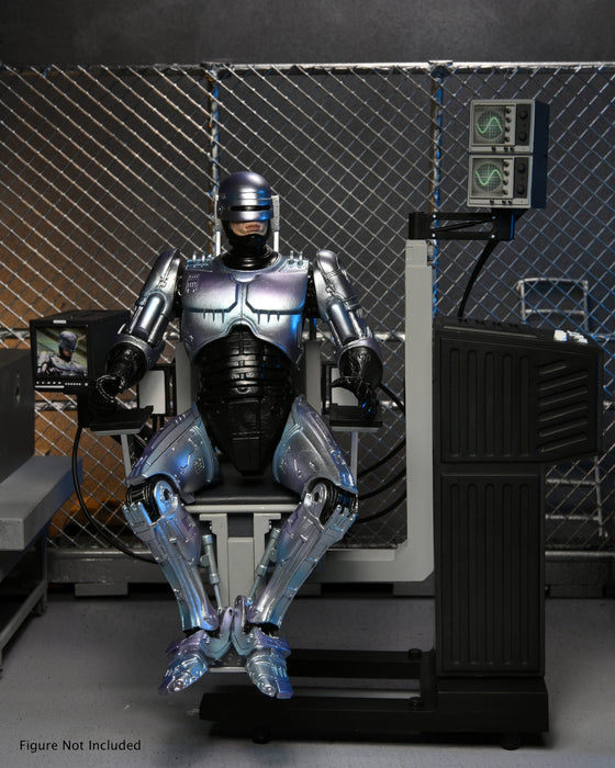 RoboCop Ultimate Battle-Damaged RoboCop with Chair 7-Inch Scale Action Figure