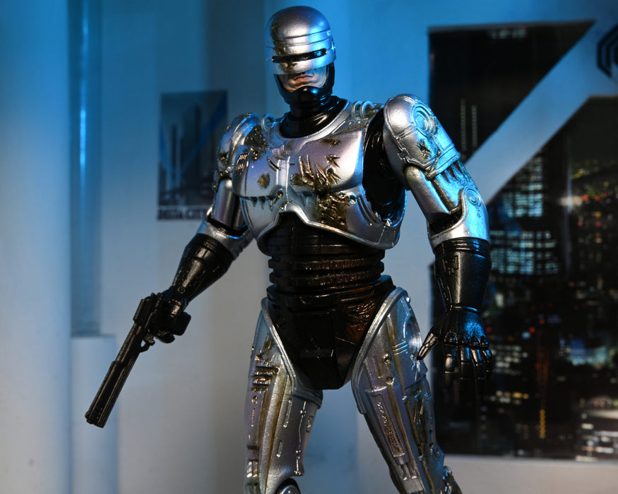 RoboCop Ultimate Battle-Damaged RoboCop with Chair 7-Inch Scale Action Figure